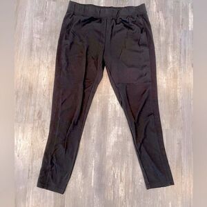 Black leggings, warm, thicker material, ridge design going down the side